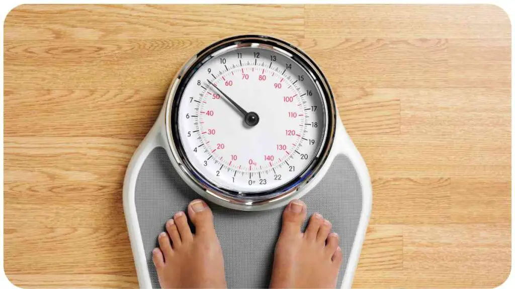 a person standing on top of a weight scale